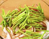 ニンニクの芽と豚肉のスタミナ丼【食遺産】作り方3写真