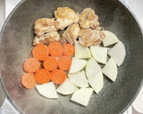 柚子胡椒風味の鶏もも肉と大根と人参の煮物作り方3写真