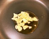 新玉ねぎ☆ニンニクと新玉ねぎの葉炒め作り方4写真