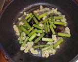 イカとアスパラのガリバタ醤油炒め作り方5写真