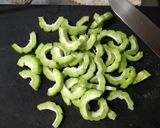 ゴーヤと豚こま肉のゴマ油醤油炒め作り方3写真
