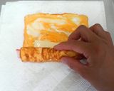 お弁当❤かにかまチーズのくるくる卵焼き❤作り方4写真