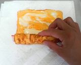 お弁当❤かにかまチーズのくるくる卵焼き❤作り方4写真