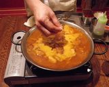 カセットコンロで鶏もも肉ゴボウのパエリア作り方8写真