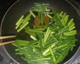 メキシコ風；豚肉とニンニクの芽の炒め物。作り方2写真