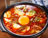 行列の韓国料理店の🍚スンドゥブチゲ🤩作り方7写真