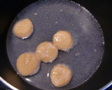 ホタテの出しで玉ねぎと大根の煮物作り方3写真