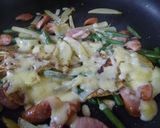 簡単！とろけるチーズのポテトウインナ炒め作り方5写真
