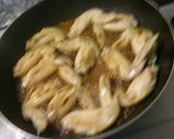 貴妃鶏翅～俺様流☆手羽先とにんにく爆弾煮作り方5写真