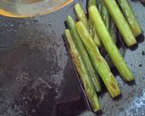 塩豚とにんにくの芽の炒め物~葱をのせて~作り方5写真