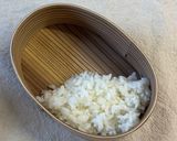 お弁当のご飯の中からこんにちは😊2段ご飯作り方1写真