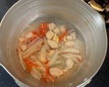 彼氏が作る『カニカマと鶏肉の白だし雑炊』作り方4写真